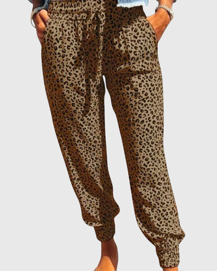 Tilde | Hose mit Löwenmuster