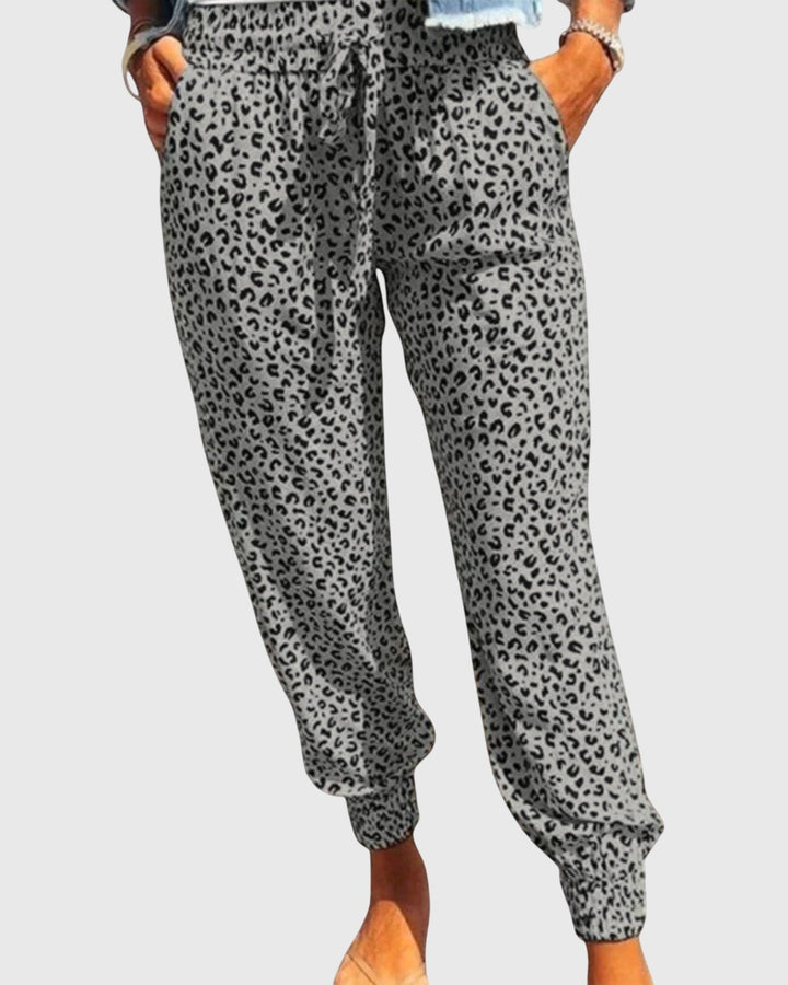 Tilde | Hose mit Löwenmuster