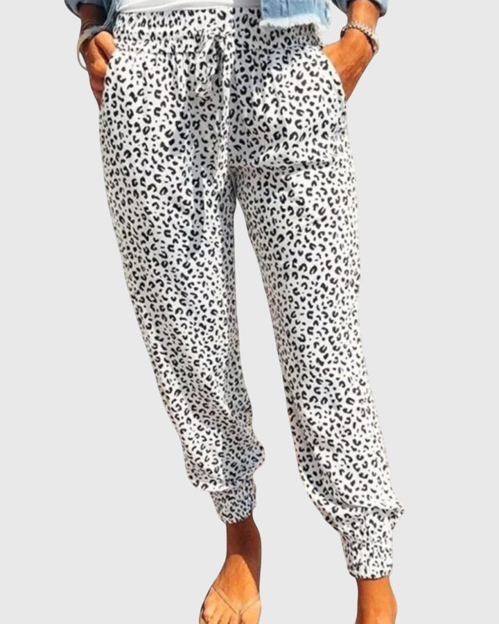 Tilde | Hose mit Löwenmuster