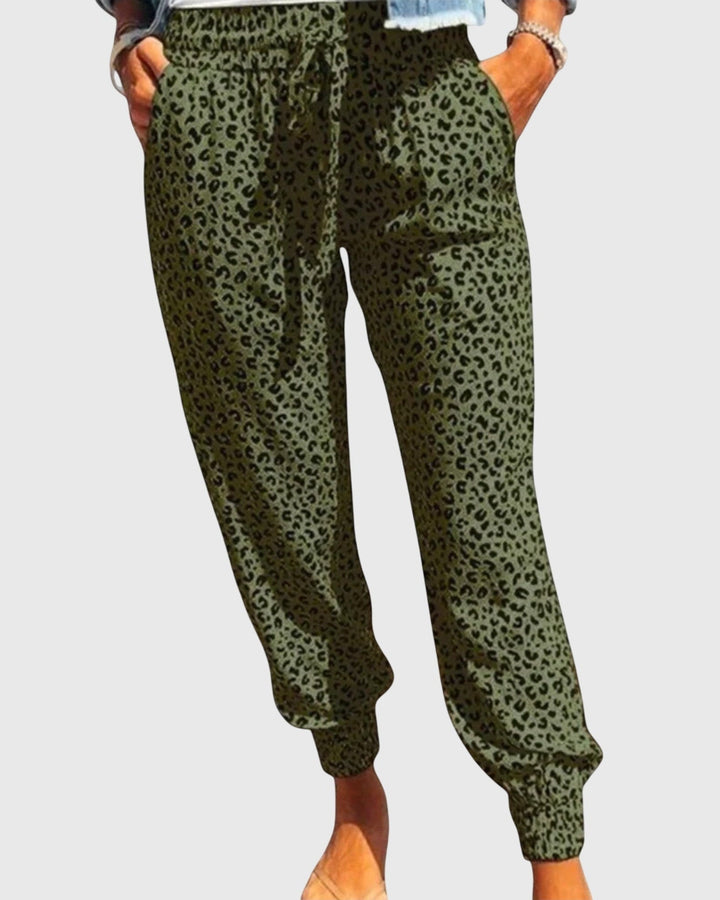 Tilde | Hose mit Löwenmuster