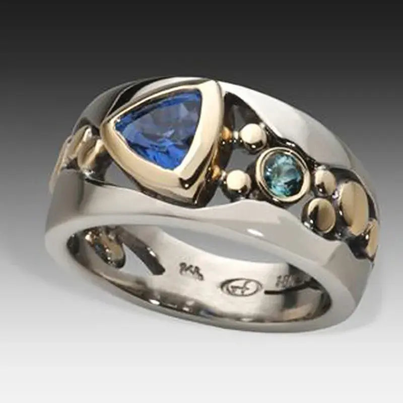 Retro-Ring mit blauem Kristall