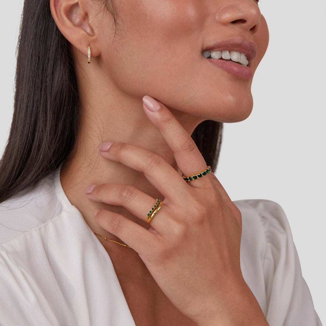 Ring mit smaragdgrünem Design